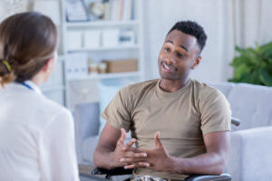 Male soldier discusses issues with truama therapist